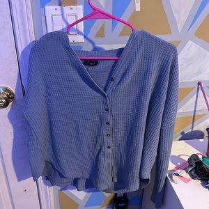 small fits like a medium blue cotton sweater with tied knot in front